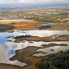 An aerial view over Vanhankaupunginlahti Bay and the Helsinki City. An aerial view over Vanhankaupunginlahti Bay and the Helsinki City.